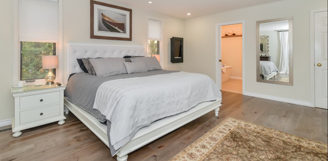 Modern grey and white bedroom home staging in Elora, Ontario