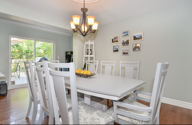Painted kitchen table, grey colour scheme, home staging decor. 